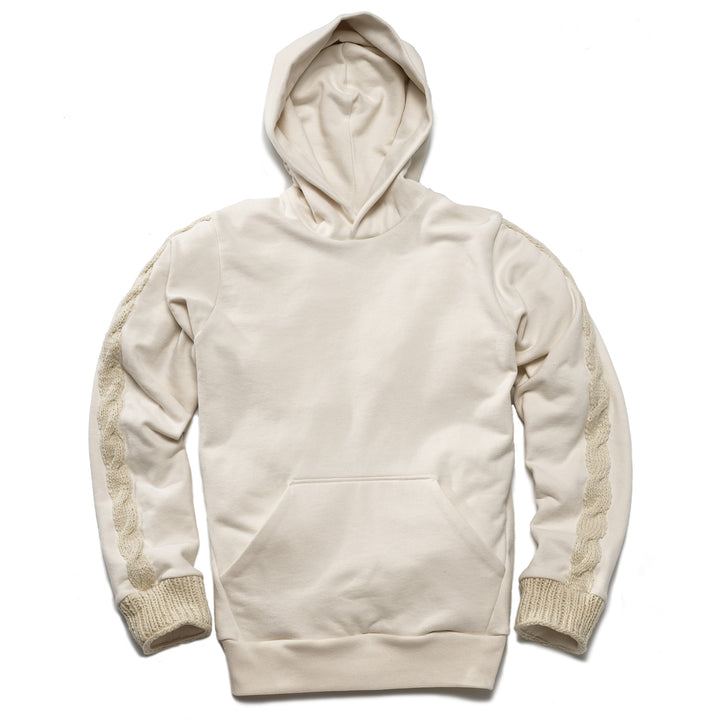 White hoodie with kangaroo pocket and hand knit wool cuffs and cable knit motif on sleeve