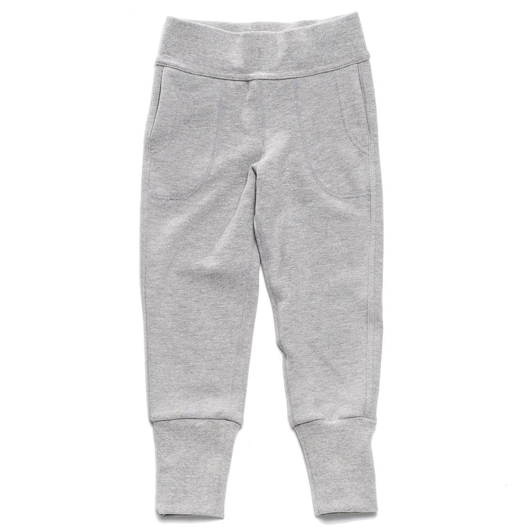 A pair of heather grey children's pants with flatlocked seams, top stitched waistband, and  grow with me cuffs rolled up slightly.