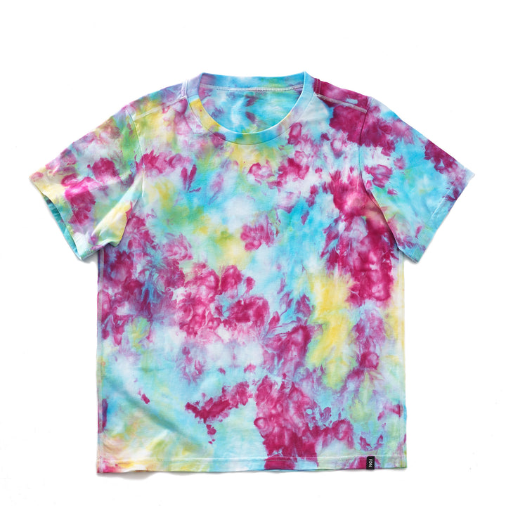 A short-sleeved, multicolored tie-dye t-shirt with a 1" rib collar, displayed on a white background.