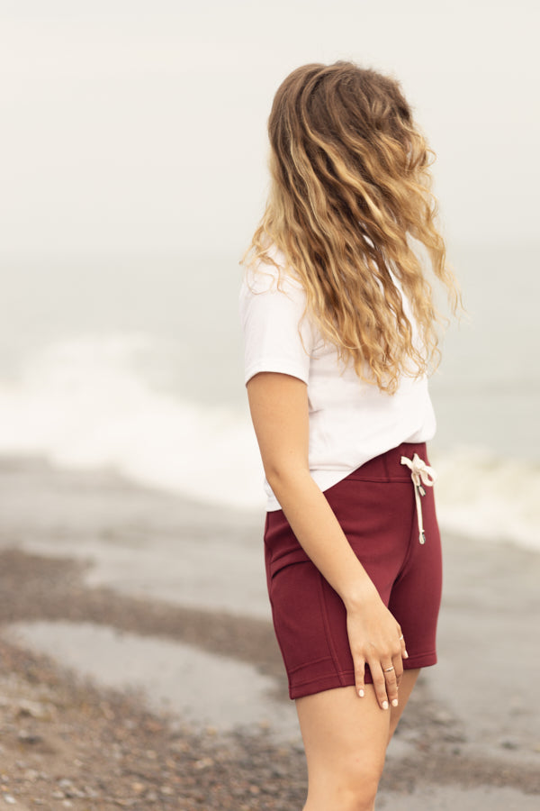 Maroon Burgundy Sweat Shorts Sustainable Mens Womens Comfortable Luxury Sueded Napped Soft French Felted Cotton Terry Fabriqué au Canada. Side cellphone pockets and side leg rib. Cotton Drawcord clothing made in canada