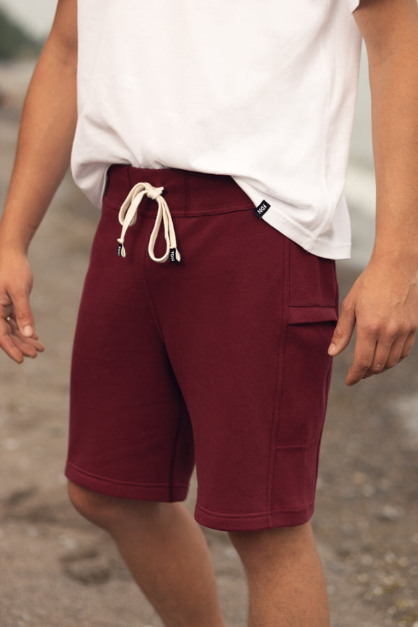 Maroon Burgundy Sweat Shorts Sustainable Mens Womens Comfortable Luxury Sueded Napped Soft French Felted Cotton Terry Fabriqué au Canada. Side cellphone pockets and side leg rib. Cotton Drawcord clothing made in canada
