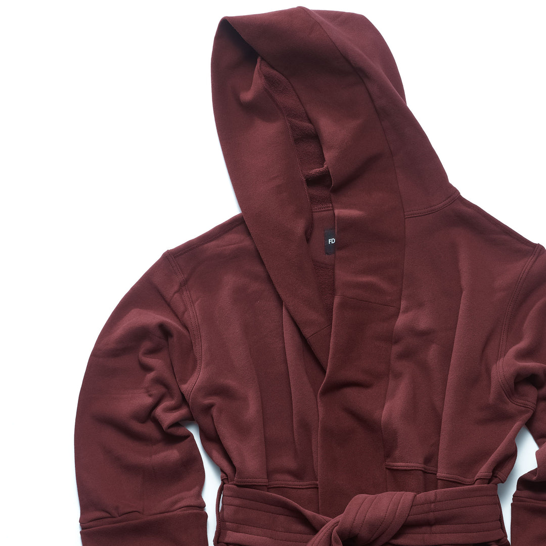 Boxer Robe - Bureau (Maroon) - Detail of big hood, and wide rib lapel. Wide belt tied in front. Rib cuff on sleeves that are folded in half - Laid flat - 100% french terry - Made in Canada - FRÈRE DU NORD