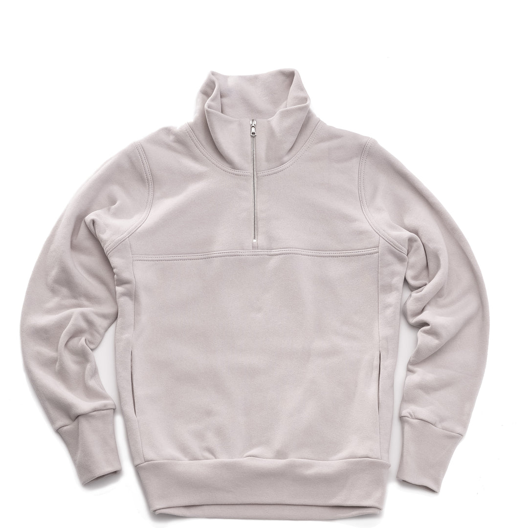Light grey pullover sweater with a quarter zip silver zipper on a white background