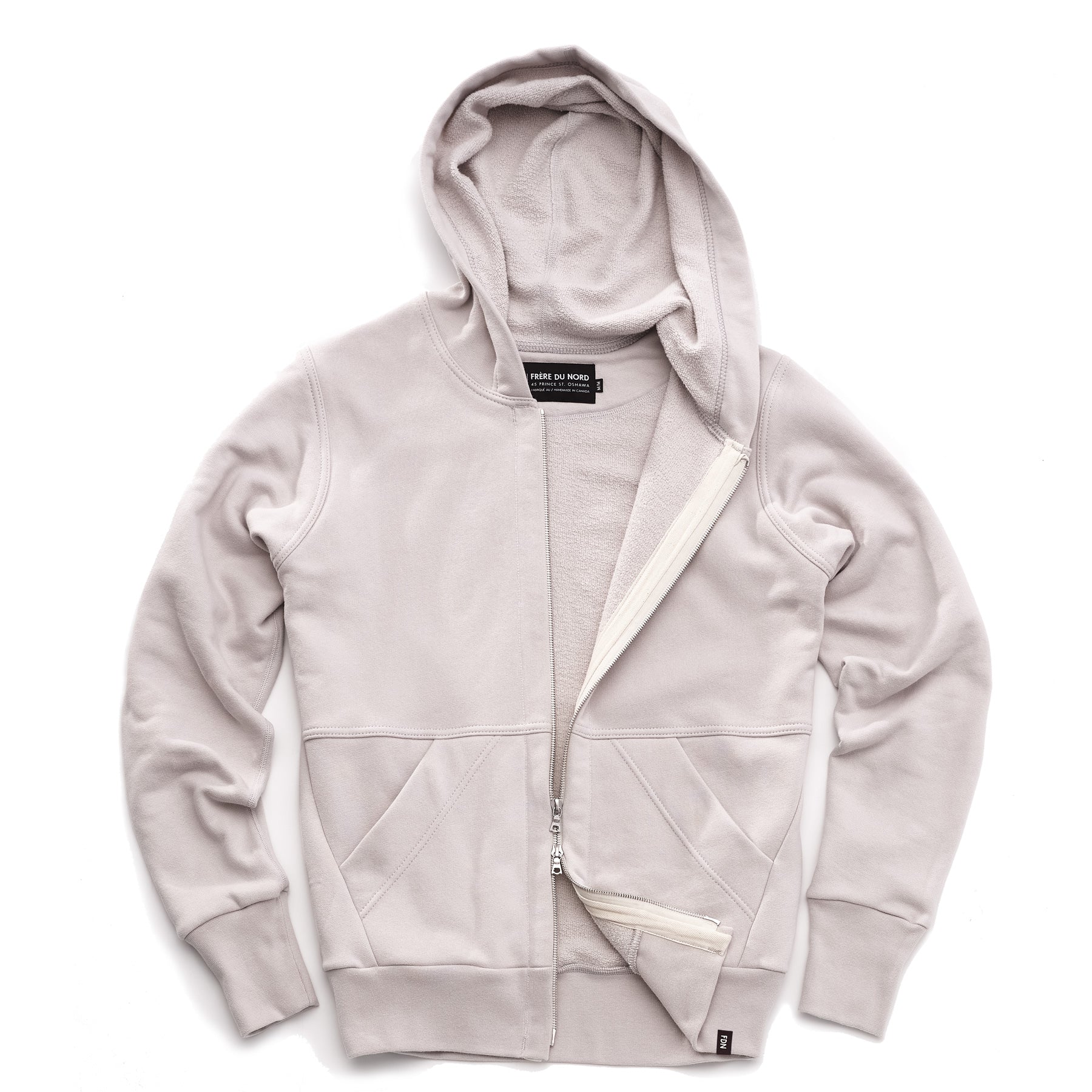 A light grey hoodie with silver two way zipper open and two front pockets.