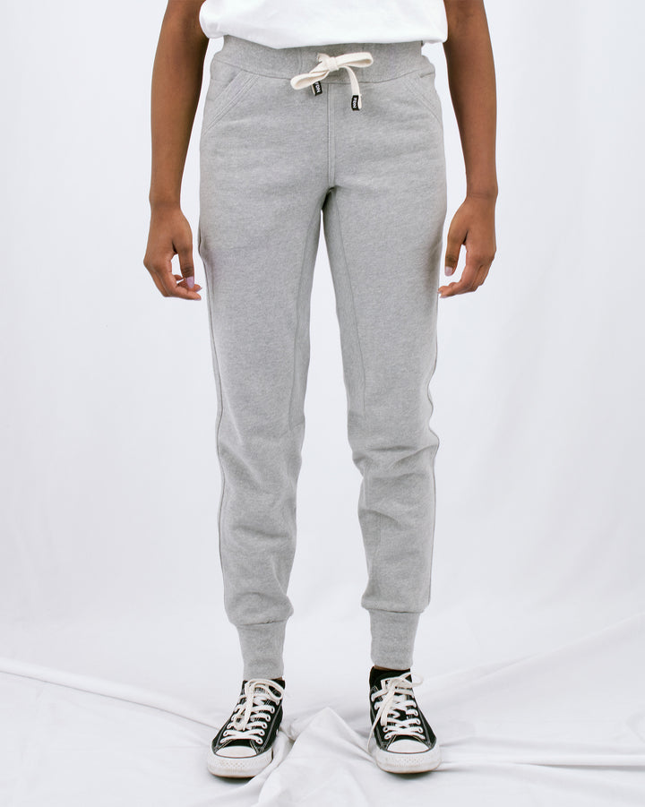 Sustainable Mens Womens Warm loungewear Sweat Pants Comfortable Luxury Light Grey Sueded Napped Soft French Felted Cotton Terry Fabriqué au Canada. High Waisted with slim tailoring in the leg. Angled front pockets with interior cellphone pockets and inner leg rib gusset. Cotton Drawcord FDN clothing made in canada
