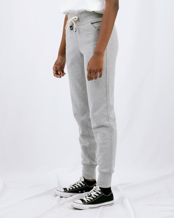 Sustainable Mens Womens Warm loungewear Sweat Pants Comfortable Luxury Light Grey Sueded Napped Soft French Felted Cotton Terry Fabriqué au Canada. High Waisted with slim tailoring in the leg. Angled front pockets with interior cellphone pockets and inner leg rib gusset. Cotton Drawcord clothing FDN made in canada