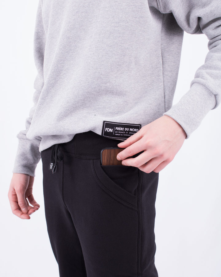 Sustainable Mens Womens Warm loungewear Sweat Pants Comfortable Luxury Black Noir Sueded Napped Soft French Felted Cotton Terry Fabriqué au Canada. High Waisted with slim tailoring in the leg. Angled front pockets with interior cellphone pockets and inner leg rib gusset. Cotton Drawcord FDN  clothing made in canada
